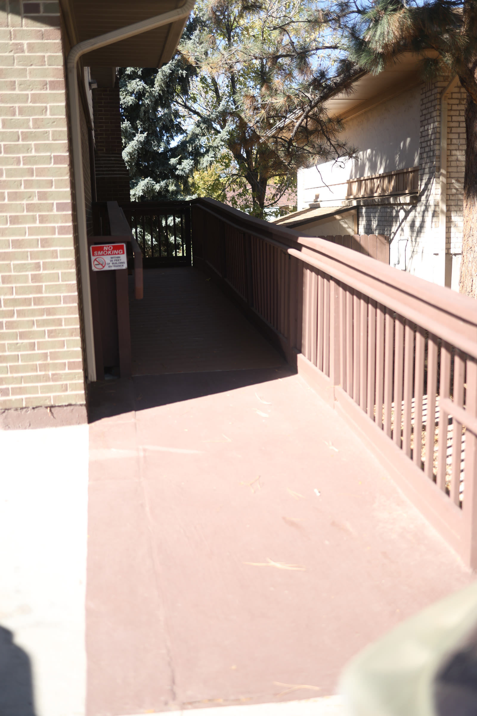 Dedicated ramped walkway with handrails