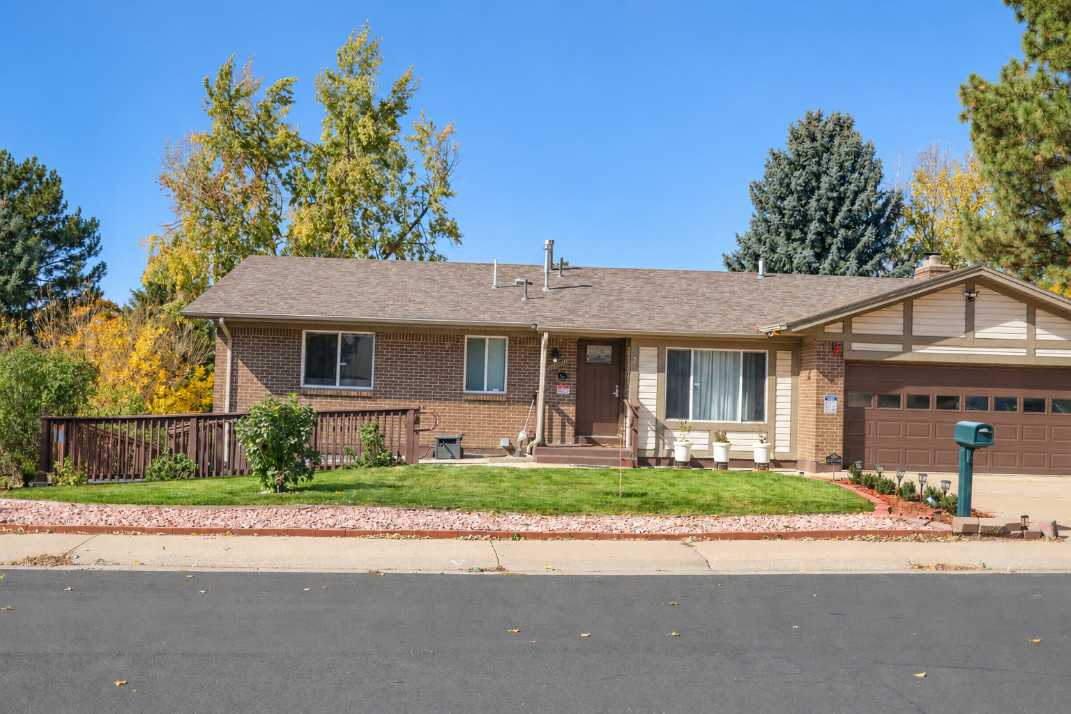 Brown Circle Haven exterior residence in Aurora Colorado with accessible ramp and landscaped lawn